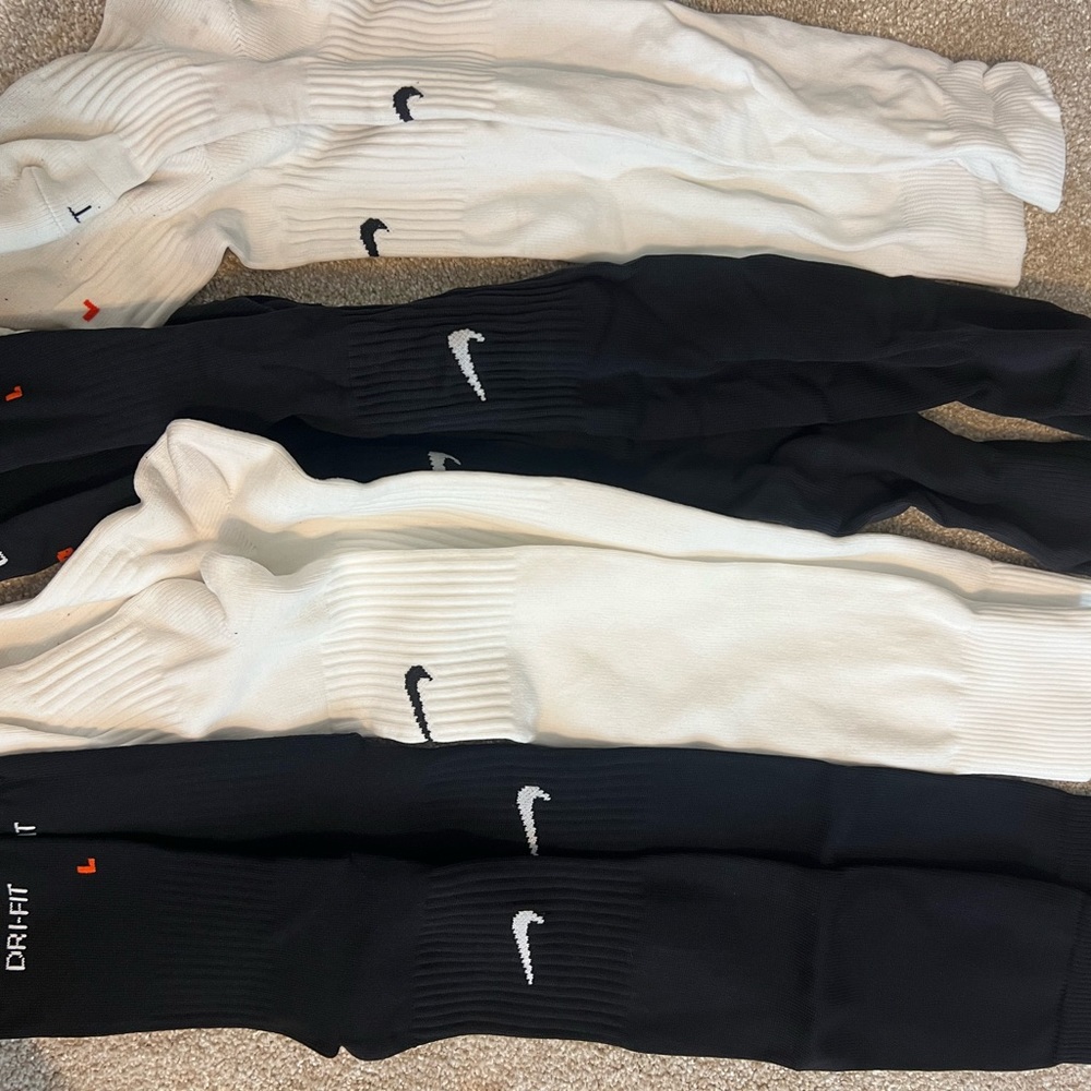 4 pairs of Nike soccer/football socks & padded underwear like new